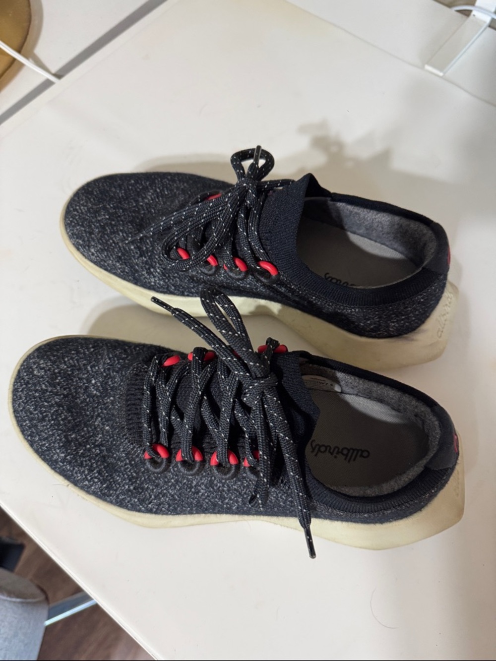 allbirds Black Knit Sneakers with Red Eyelets